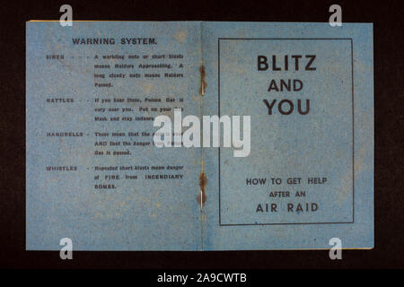 Front/rear cover of the 'Blitz And You' booklet,  'How to get help after an air raid', a piece of replica memorabilia from the Blitz era of the 1940s. Stock Photo