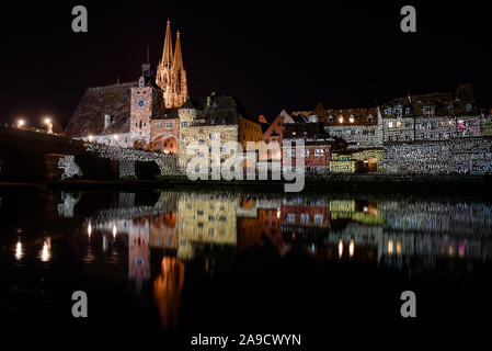 Old town of Regensburg in a very special light on 'Welterbetag' (World Heritage Day) Stock Photo