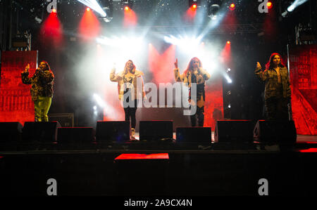 Manchester, UK. 14th Nov, 2019. Girl Group Four of Diamonds perform at the city's Christmas Lights Switch On event on Deansgate. Credit: Russell Hart/Alamy Live News Stock Photo