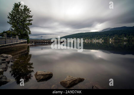 Beautiful view over Burrard Inlet at high tide in Rocky Point Park, Port Moody, B.C., Canada Stock Photo