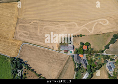 Motocross tracks on a field at Kleinhofweg, Heiligenhaus, Ruhr area, North Rhine-Westphalia, Germany Stock Photo