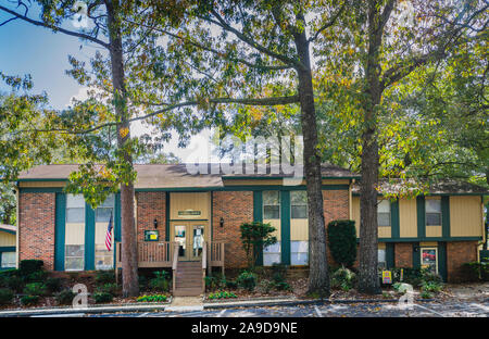 The leasing office welcomes residents to Autumn Woods apartment homes in Mobile, Alabama. Stock Photo