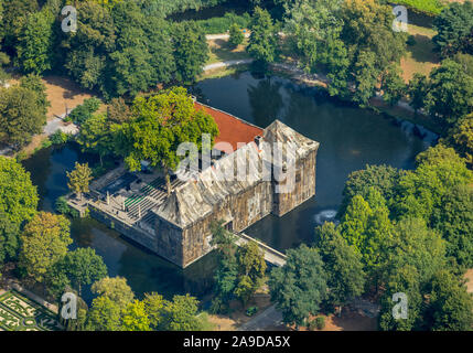 Artistically cloaked castle Strünkede, Herne, Ruhr area, North Rhine-Westphalia, Germany Stock Photo