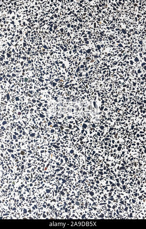 Natural background of white marble terrazzo pattern. Texture of mosaic floor with natural stones, granite, marble, quartz, limestone, concrete. Polish Stock Photo
