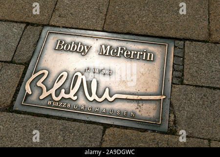 Bronze plaque in honor of Bobby Mc Ferrin, Street of Fame, Burghausen, Upper Bavaria, Bavaria, Germany Stock Photo