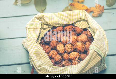 Harvest time - walnuts (Juglans regia) lying out to dry in the sun Stock Photo
