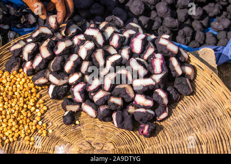 water chestnut stacked for sale in market in india Stock Photo