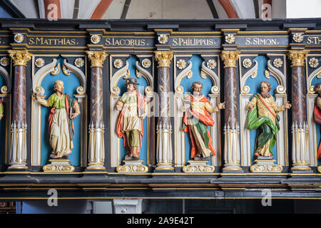 Europe, Germany, Lower Saxony, Otterndorf. Balustrade of the pulpit gallery (about 1644) with carved figures of a saint in the Severi church (so calle Stock Photo