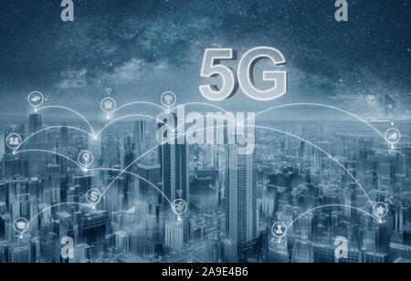 Futuristic city with 5G internet and application icons, Smart city Stock Photo