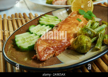 Dijon Maple Glazed Salmon, small bowl mix mustard, maple syrup, salt, and pepper. Stock Photo