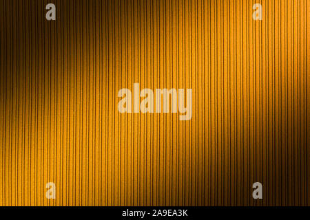 Decorative background yellow color, striped texture diagonal gradient. Wallpaper Art. Design Stock Photo