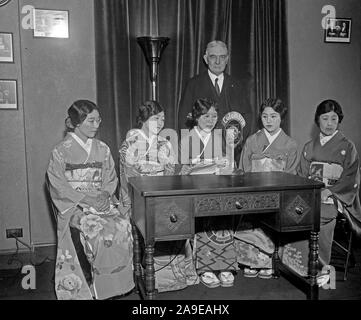 Group of Japanese women at Columbia microphone ca. May or June 1930 Stock Photo