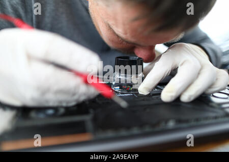 Technicial support of laptop Stock Photo