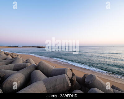 travel to South Korea - stone blocks on sand Deungdae beach in Sokcho city at autumn dawn Stock Photo