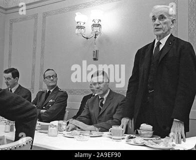 Speaker of the House John W. McCormack (D-Massachusettes) (standing), addresses those attending a luncheon at the US Capitol honoring top Department of Defense executives.  Left to right are Congressman George H. Mahon (D-Texas), committee chairman of the US House of Representatives Appropriations Committee; General (GEN) Earle G. Wheeler, Chairman, US Army Joint Chiefs of Staff; Secretary of Defense Robert S. McNamara and Congressman McCormack. Stock Photo