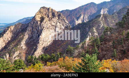 travel to South Korea - panoramic view of rocks and color mountain slope in Seoraksan National Park in South Korea in autumn Stock Photo