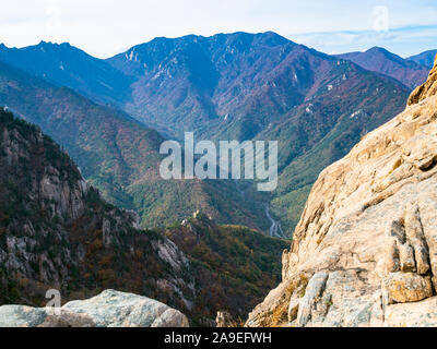 travel to South Korea - old rocks and view of gorge in Seoraksan National Park in South Korea in autumn Stock Photo