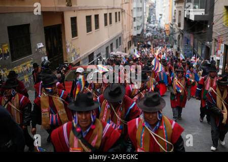 La Paz, Bolivia. 14th Nov, 2019. Supporters of former President Morales take part in a protest march. A supporter of former Bolivian President Morales, who fled into exile, has been elected as the new chairman of the Chamber of Deputies. After his controversial re-election, Morales resigned under pressure from the military and police. Credit: Gaston Brito/dpa/Alamy Live News Stock Photo