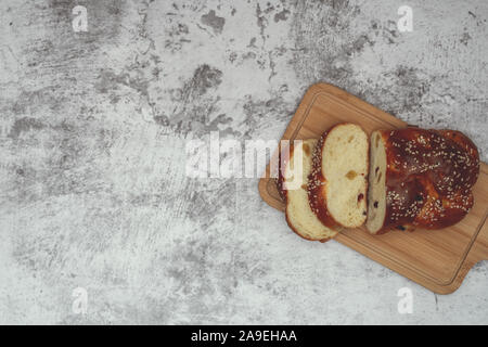 Flat lay, breakfast brunch on table. Loaf and two slices of bread. Stock Photo