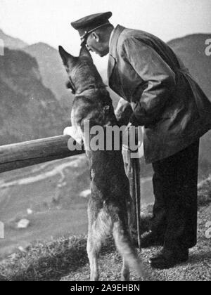 Eva Braun Collection (trinaest) - Adolf Hitler with his German Shepherd dog ca. late 1930s or early 1940s Stock Photo