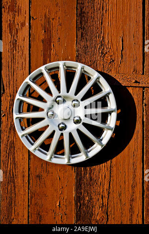 Old rim on wood Stock Photo