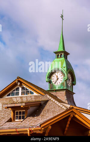 Wengen, Switzerland railway train station old wooden house with clock tower Stock Photo