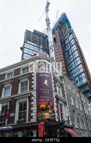 The Flying Horse public house and One Crown Place, Stock Photo