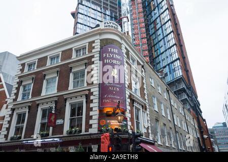 The Flying Horse public house and One Crown Place, Stock Photo