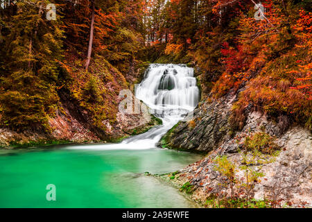 Waterfall in the autumn forest Stock Photo