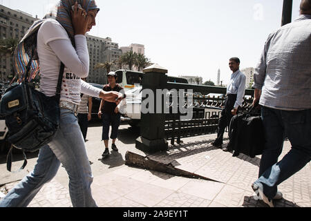 Cairo, Egypt, May 3, 2008: People walk in the streets of Cairo. Stock Photo