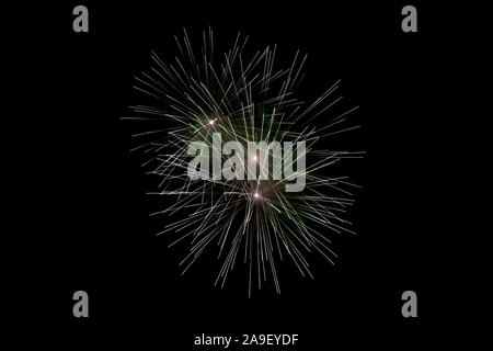 White Sparkling Fireworks Background on Night Scene. Fireworks background and smoke on sky Stock Photo