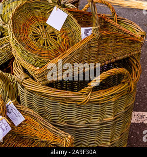 hand made wicker baskets made from weaving willow stems Stock Photo