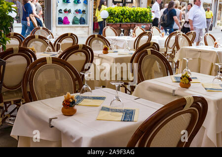 Venice, Italy - September 27, 2013: Tables set for al fresco dining restaurant in Venice Stock Photo