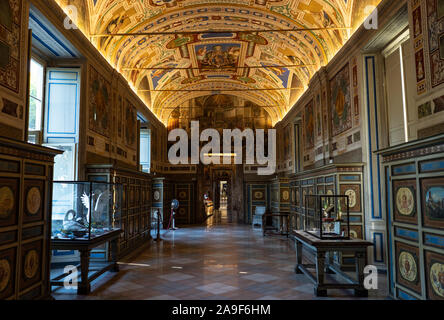 Interiors of Vatican museum. No people in the halls of Museum of Vatican. Beautiful paintings and sculptures in Vatican museum with no people around. Stock Photo