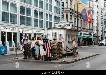 Berlin, Germany - July 29, 2019: Checkpoint Charlie. It was the name given by the Western Allies to the best-known Berlin Wall crossing point between Stock Photo