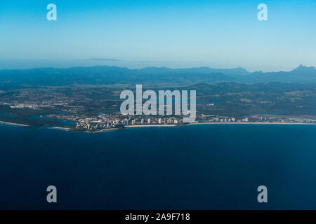Aerial view of Coolangatta with distant mountains of Springbrook National Park , Gold Coast, Australia
