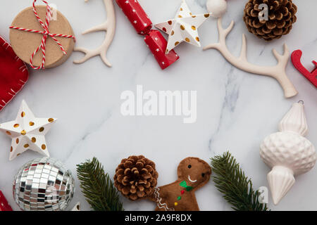 Christmas layflat compostion, festive decorations on a marble background Stock Photo