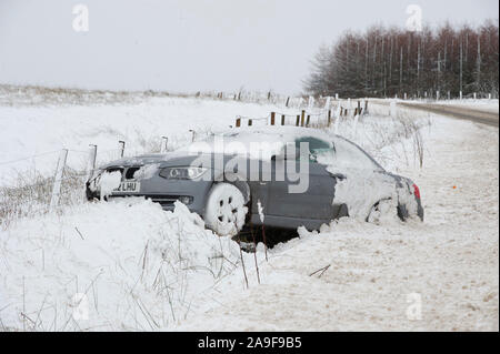 Storm Doris: Weather pictures North Lanarkshire: A car crashed off the road in snow near Caldercruix North Lanarkshire. Stock Photo