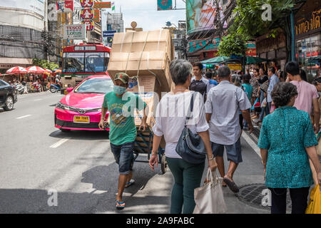 Bangkok, Thailand - 26th September 2018: Typical street scene on Yaowarat Road in Chinatown. This is the major thoroughfare through the area. Stock Photo