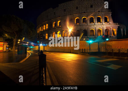 night view of street and Colosseum in Rome Stock Photo