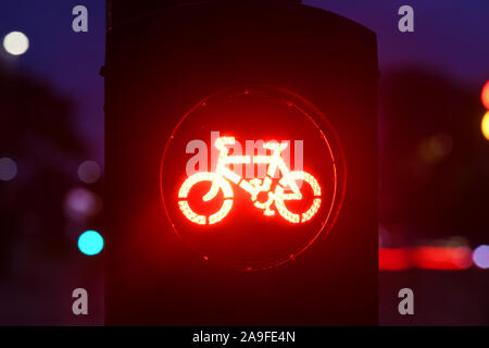 traffic lights for cyclists on new Leeds super cycle highway at twilight united kingdom Stock Photo