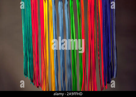 hanging ribbons of different colors Stock Photo
