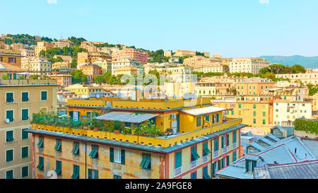 Panorama of Genoa city with residential buildings in the evening, Italy Stock Photo