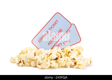 Popcorn pile with tickets isolated on white background, close up Stock Photo