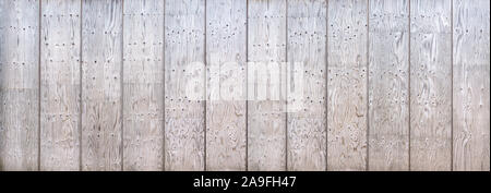 Wooden wall made of composed boards Stock Photo