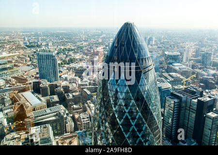 The tip of London's iconic Gherkin building from up high Stock Photo