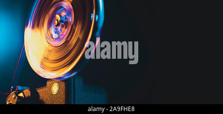 Vintage old fashioned projector in a dark room Stock Photo