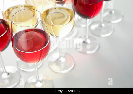 Glasses with different wine on white background, close up Stock Photo