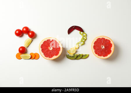2020 laid out of fruits and vegetables on white background, copy space Stock Photo