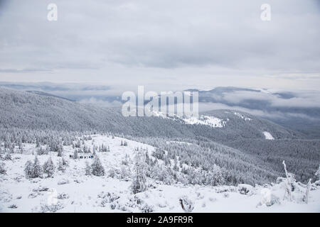 Beautiful winter mountain landscape. Winter landscape with fresh snow in a mountain forest Stock Photo